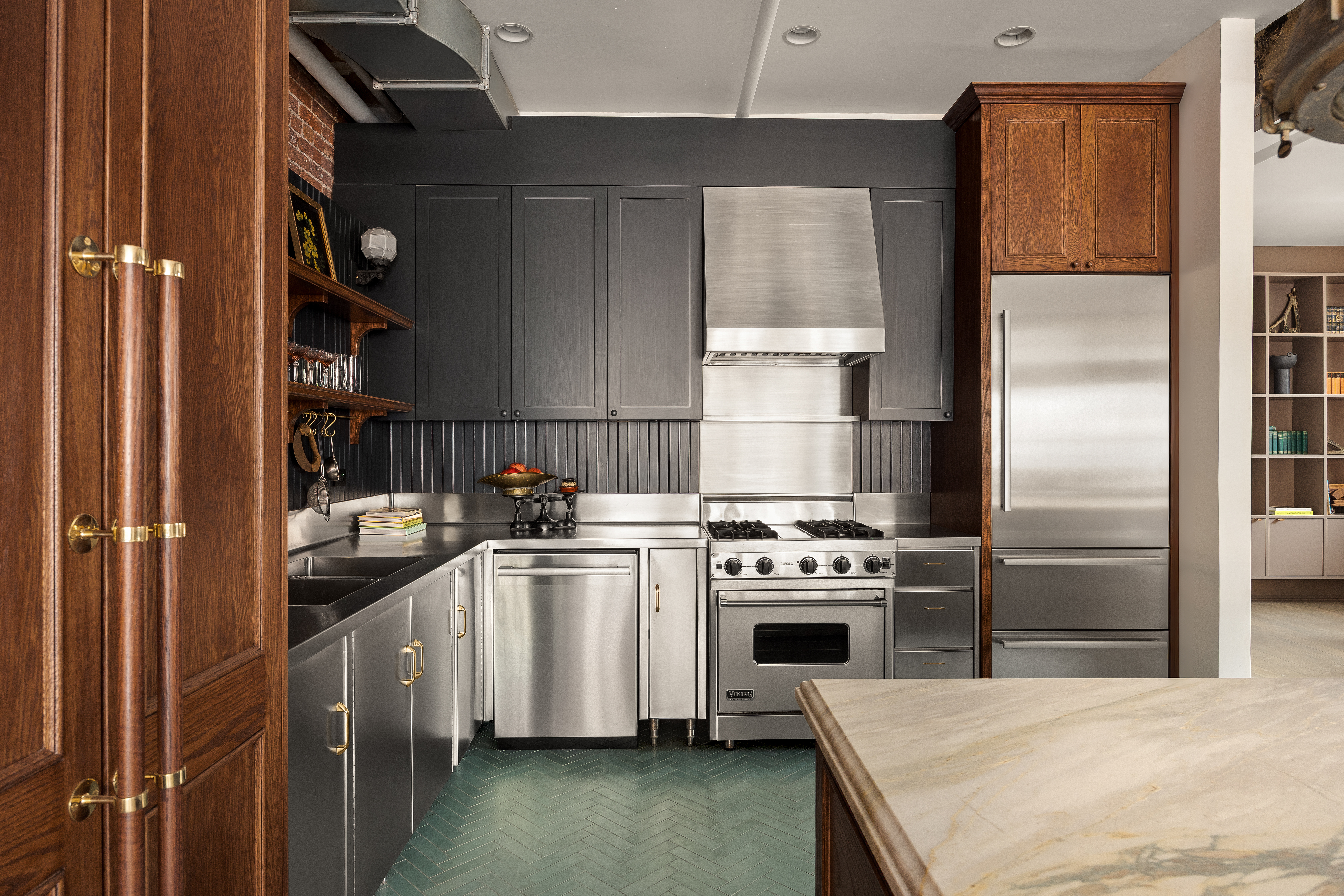 182 Lafayette Street, Unit 5 Manhattan, NY 10013 - Photo 9 of 19 a kitchen with a stove and a refrigerator