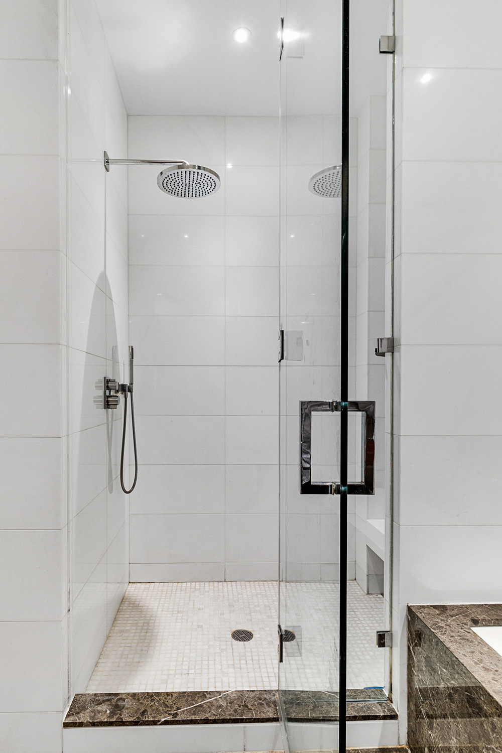 15 Hubert Street, Unit 2C Manhattan, NY 10013 - Photo 7 of 15 a bathroom with a glass shower door