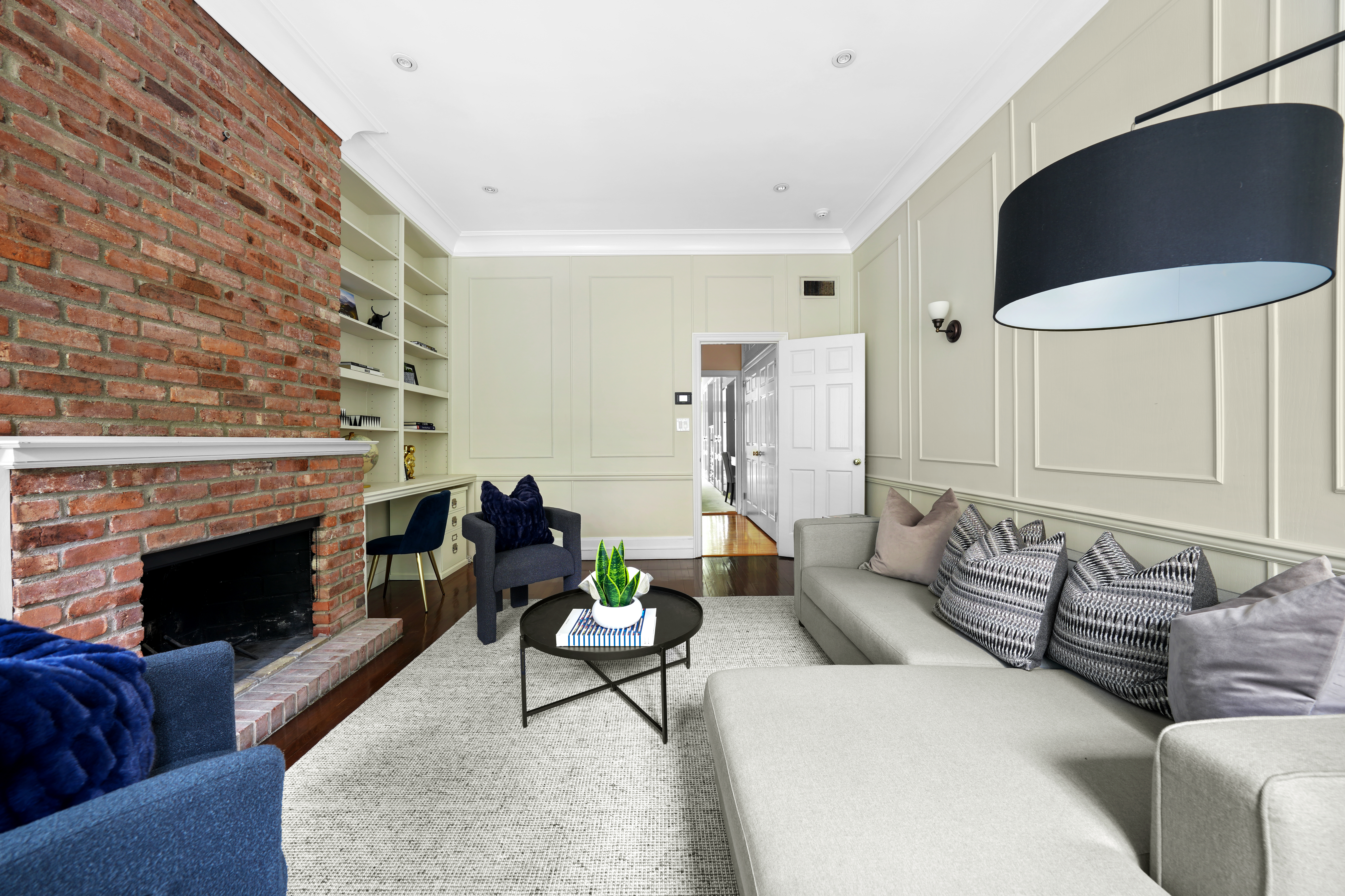 247 East 71st Street Manhattan, NY 10021 - Photo 15 of 31 a living room with furniture and a fireplace