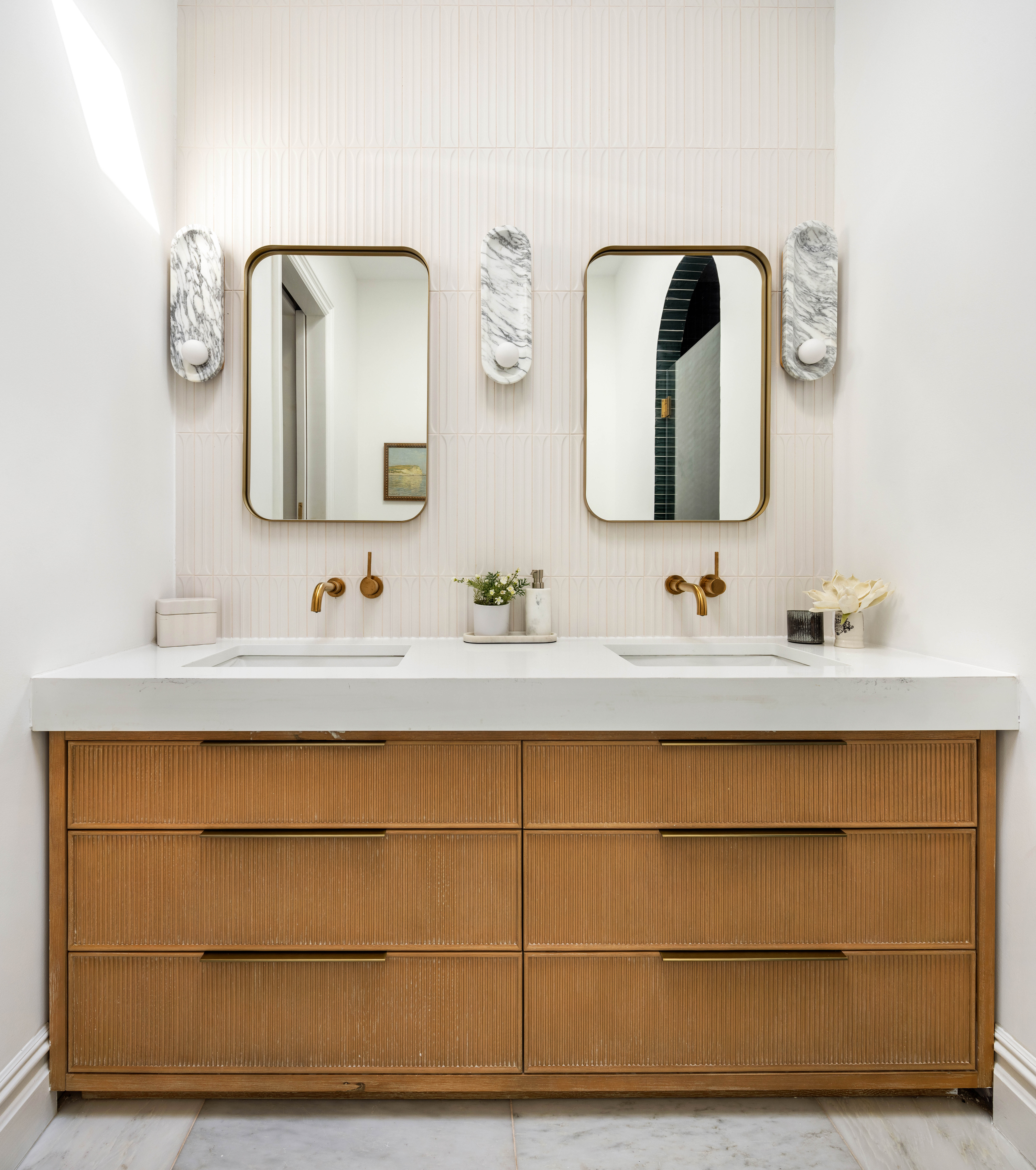 286 Dekalb Avenue Brooklyn, NY 11205 - Photo 10 of 17 a bathroom with a sink and a mirror