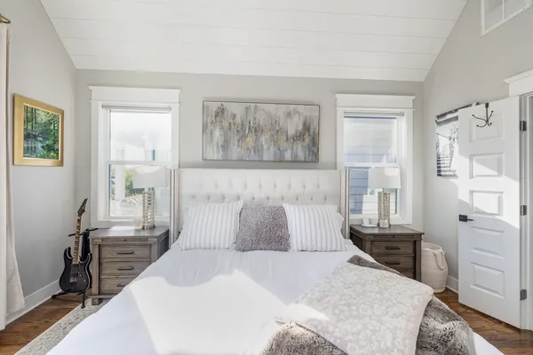 a spacious bathroom with a double vanity sink mirror and shower
