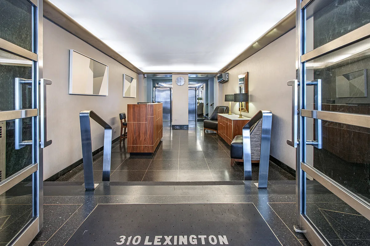 310 Lexington Avenue, Unit 1B Manhattan, NY 10016 - Photo 7 of 10 a view of an entryway and livingroom with furniture