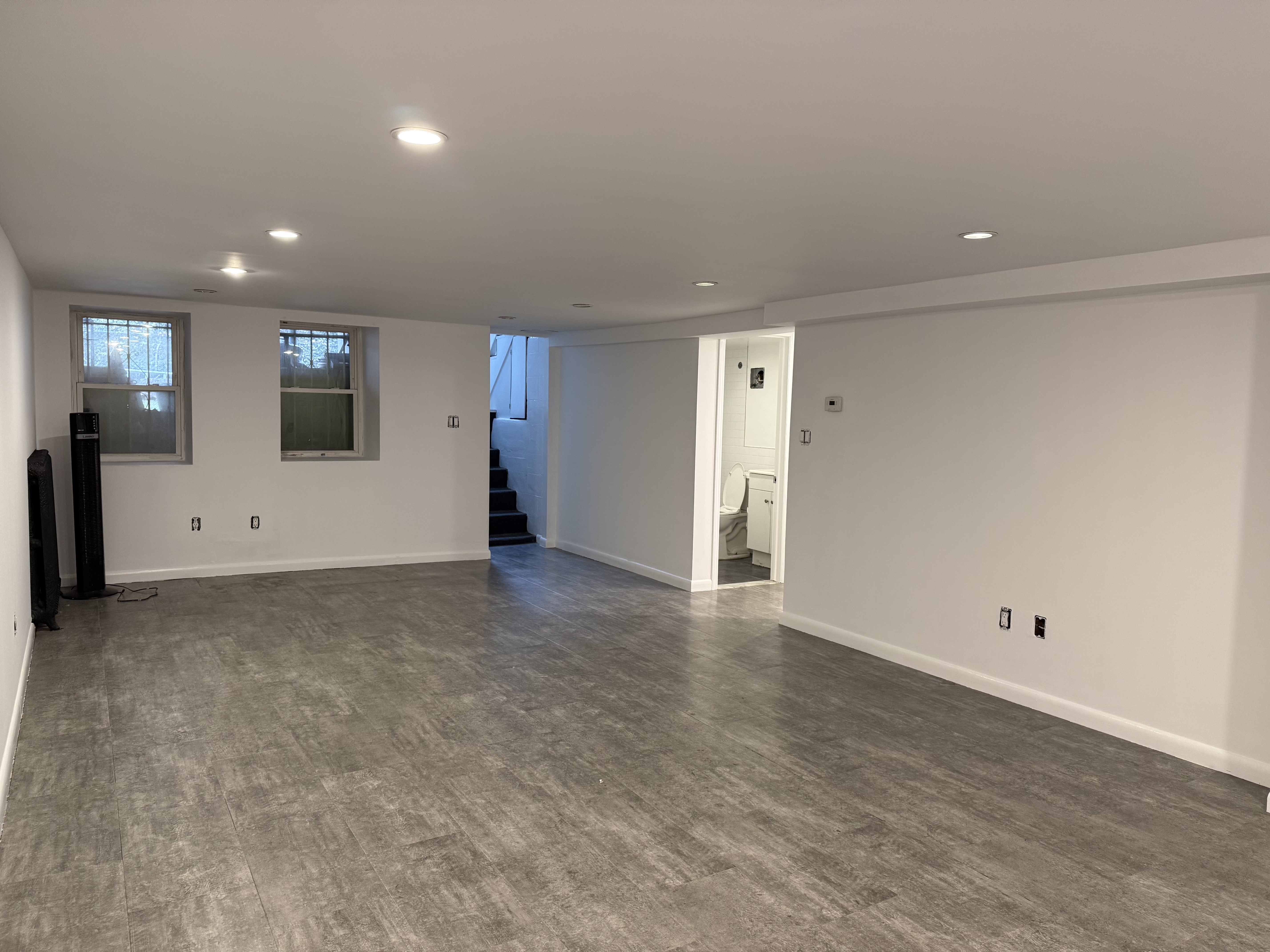 249 94th Street, Unit 1 Brooklyn, NY 11209 - Photo 8 of 13 an empty room with window and pillar in it