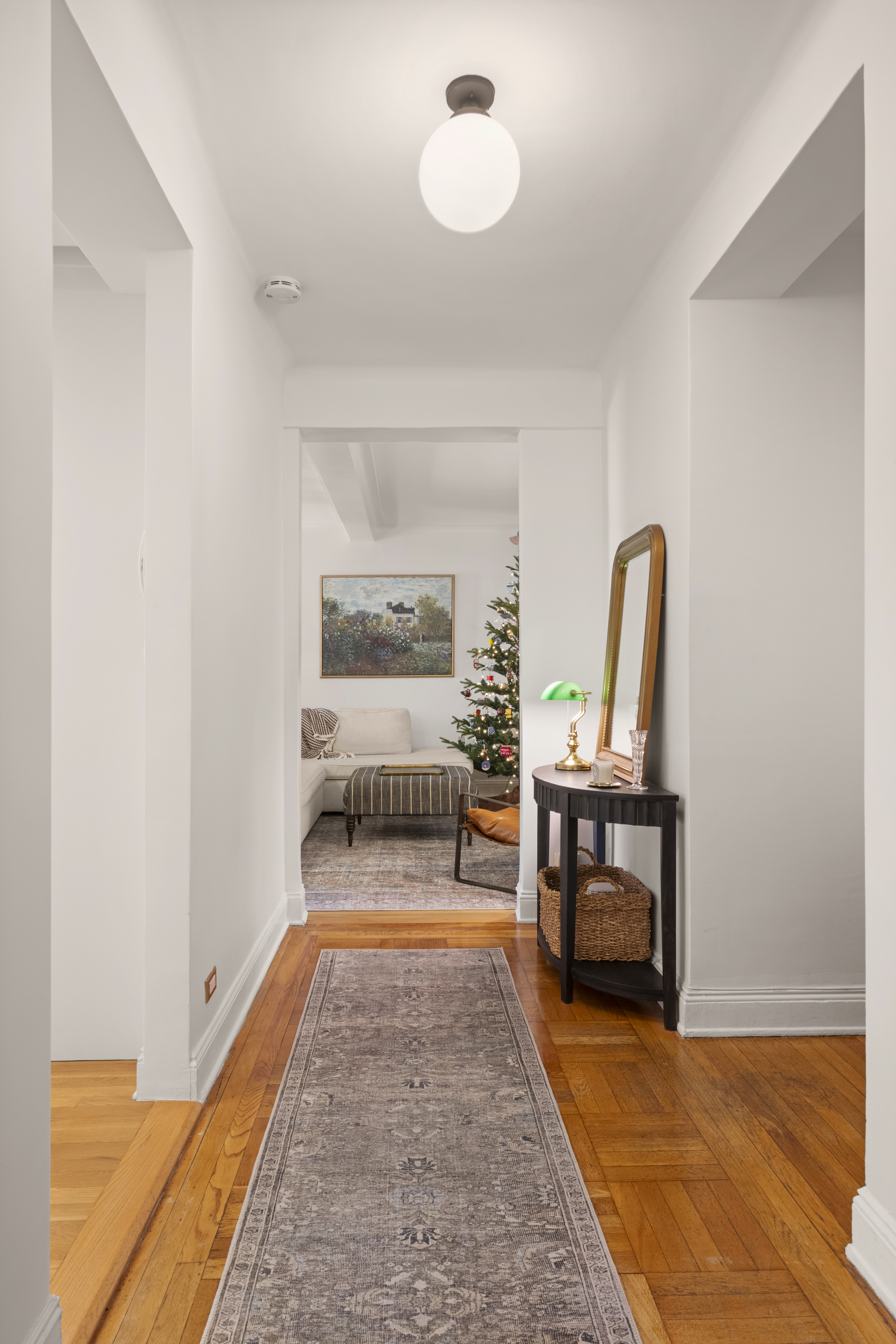 245 East 72nd Street, Unit 6F Manhattan, NY 10021 - Photo 3 of 9 a living room with furniture