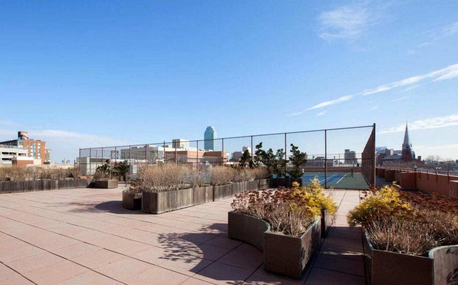 4-74 48th Avenue, Unit 34G Queens, NY 11109 - Photo 6 of 9 a view of a terrace