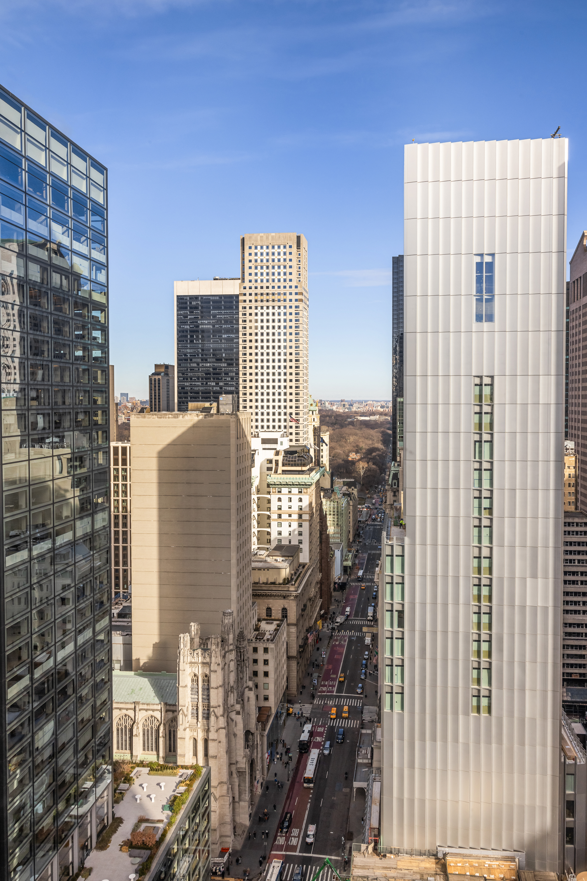 641 5th Avenue, Unit 27A Manhattan, NY 10022 - Photo 27 of 29 a view of a city with tall buildings