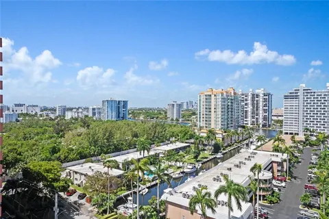 a view of a city with tall buildings