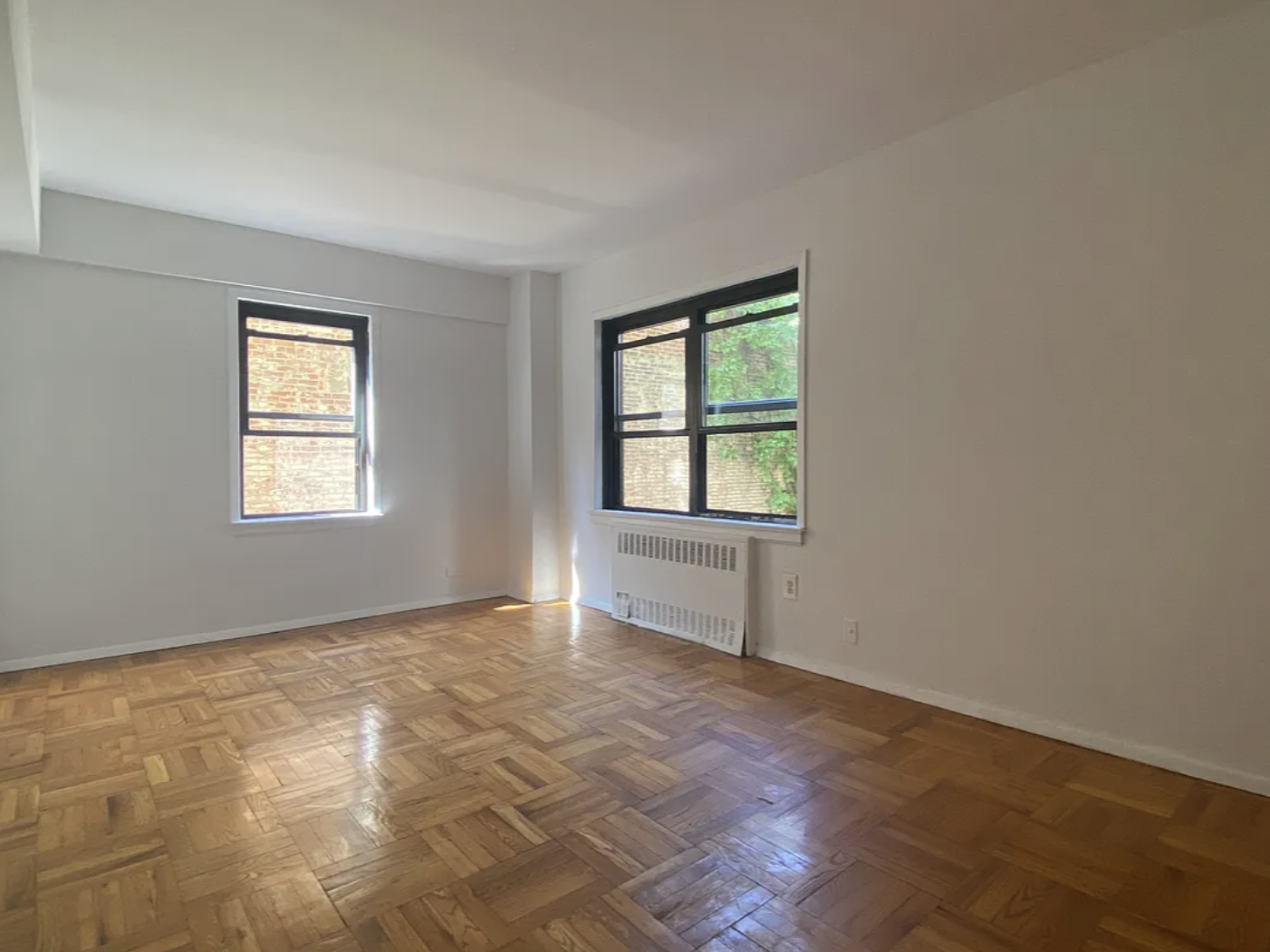 an empty room with windows