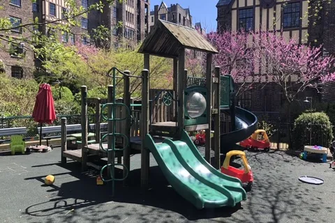 a living room with stainless steel appliances kitchen island granite countertop furniture and a kitchen view