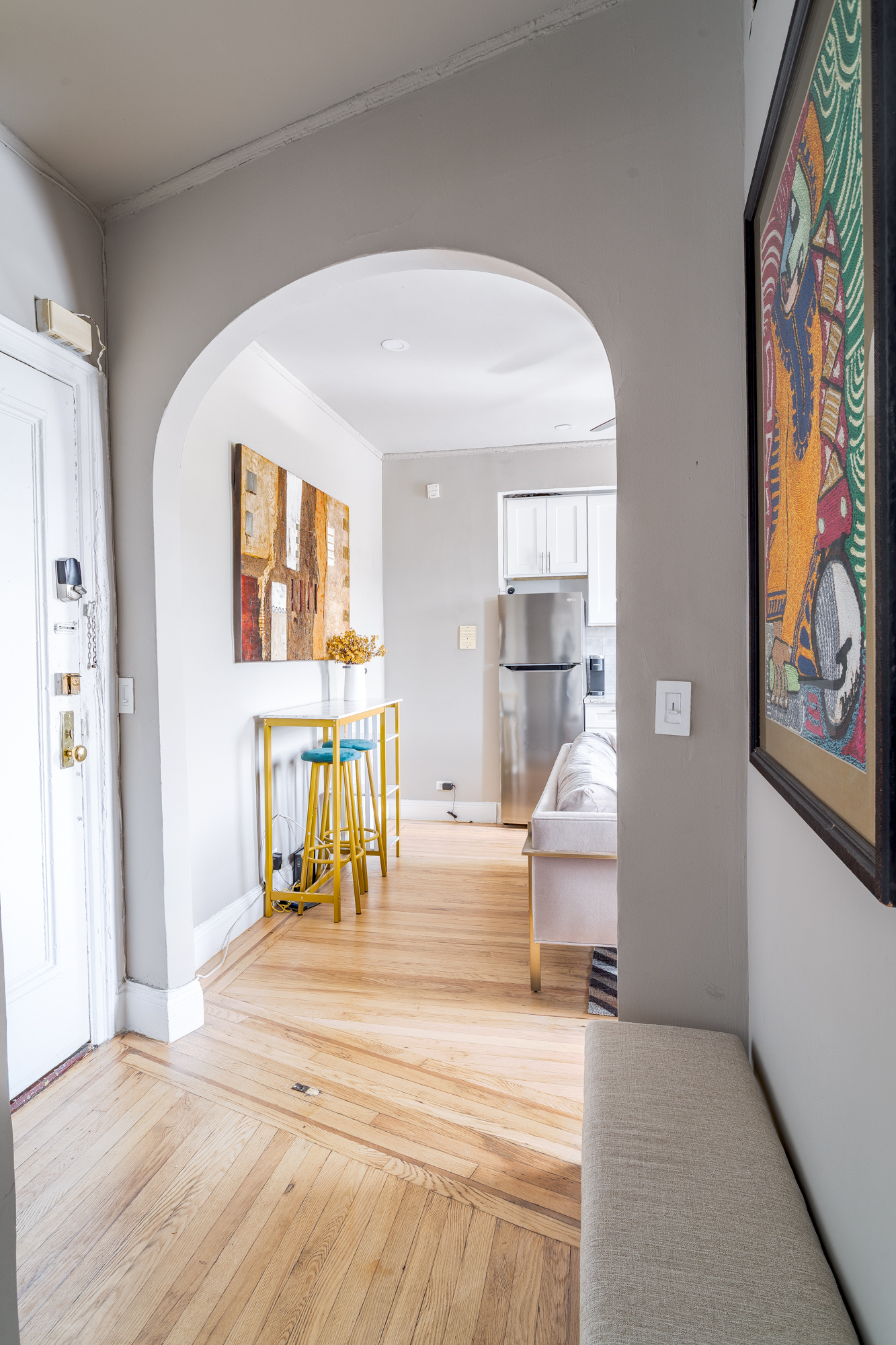 94 Hamilton Place, Unit 6E Manhattan, NY 10031 - Photo 8 of 16 a view of an entryway with wooden floor