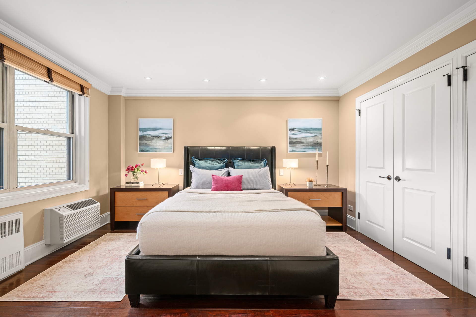 40 East 9th Street, Unit 6M Manhattan, NY 10003 - Photo 11 of 22 a bedroom with a large bed and a window