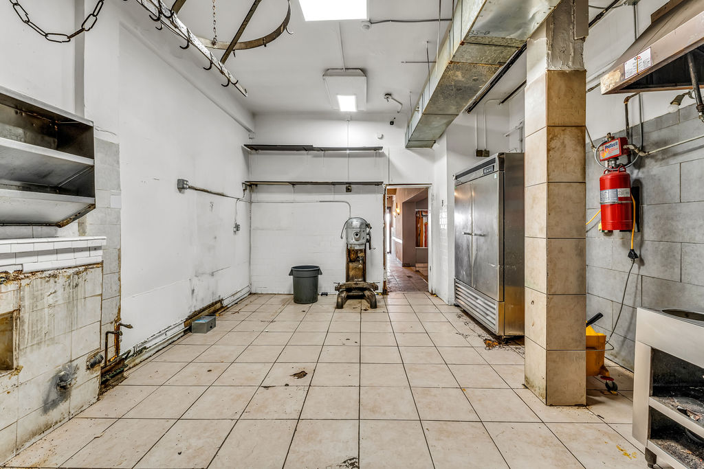 601-603 Washington Street, Unit RESTAURANT Hoboken, NJ 07030 - Photo 21 of 27 a view of a refrigerator in kitchen and an empty room