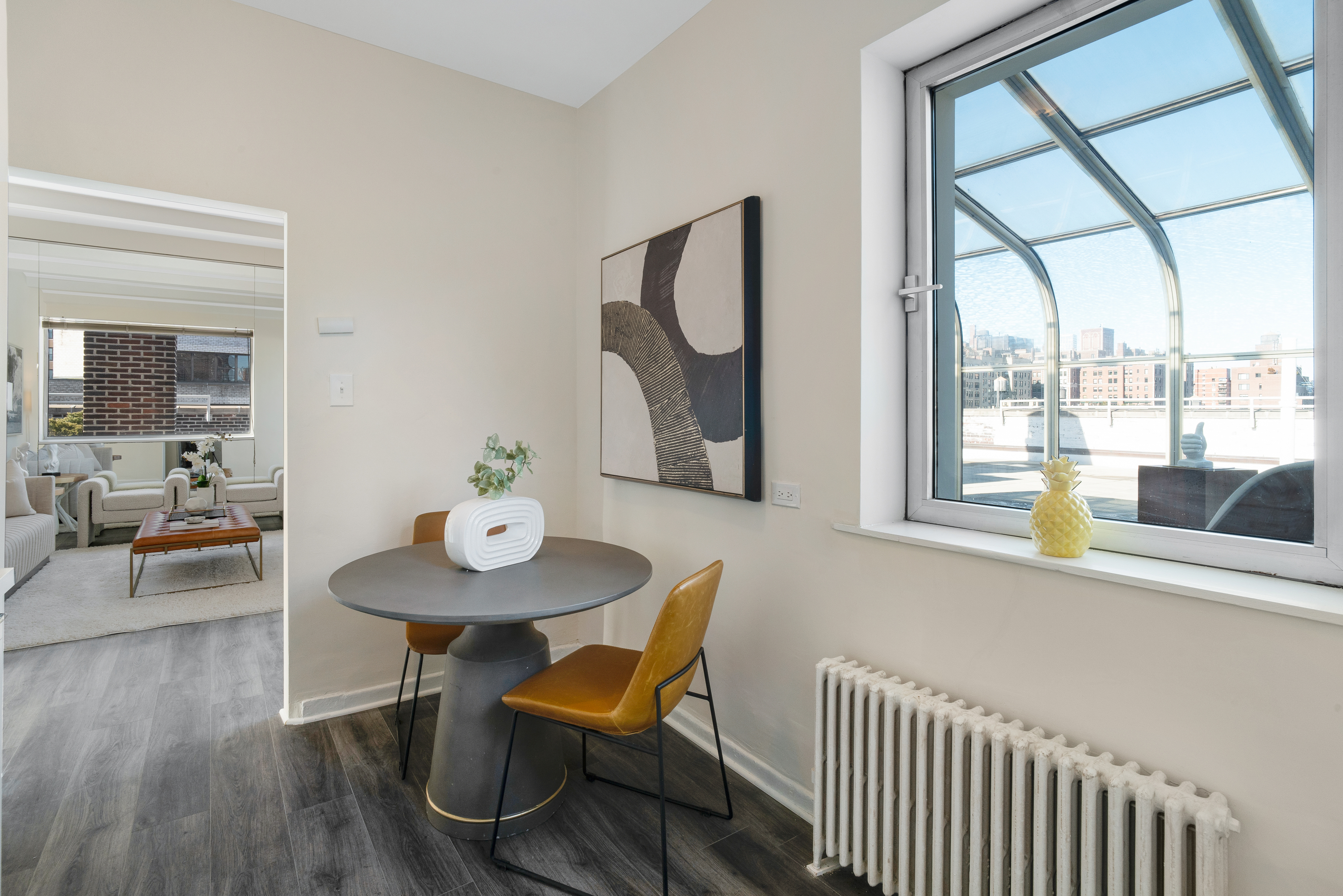 1349 Lexington Avenue, Unit PH2 Manhattan, NY 10128 - Photo 7 of 18 a view of a dining room with furniture window and outside view