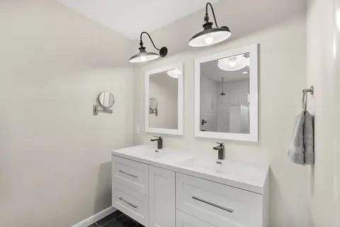 a backyard of a house with yard and outdoor seating