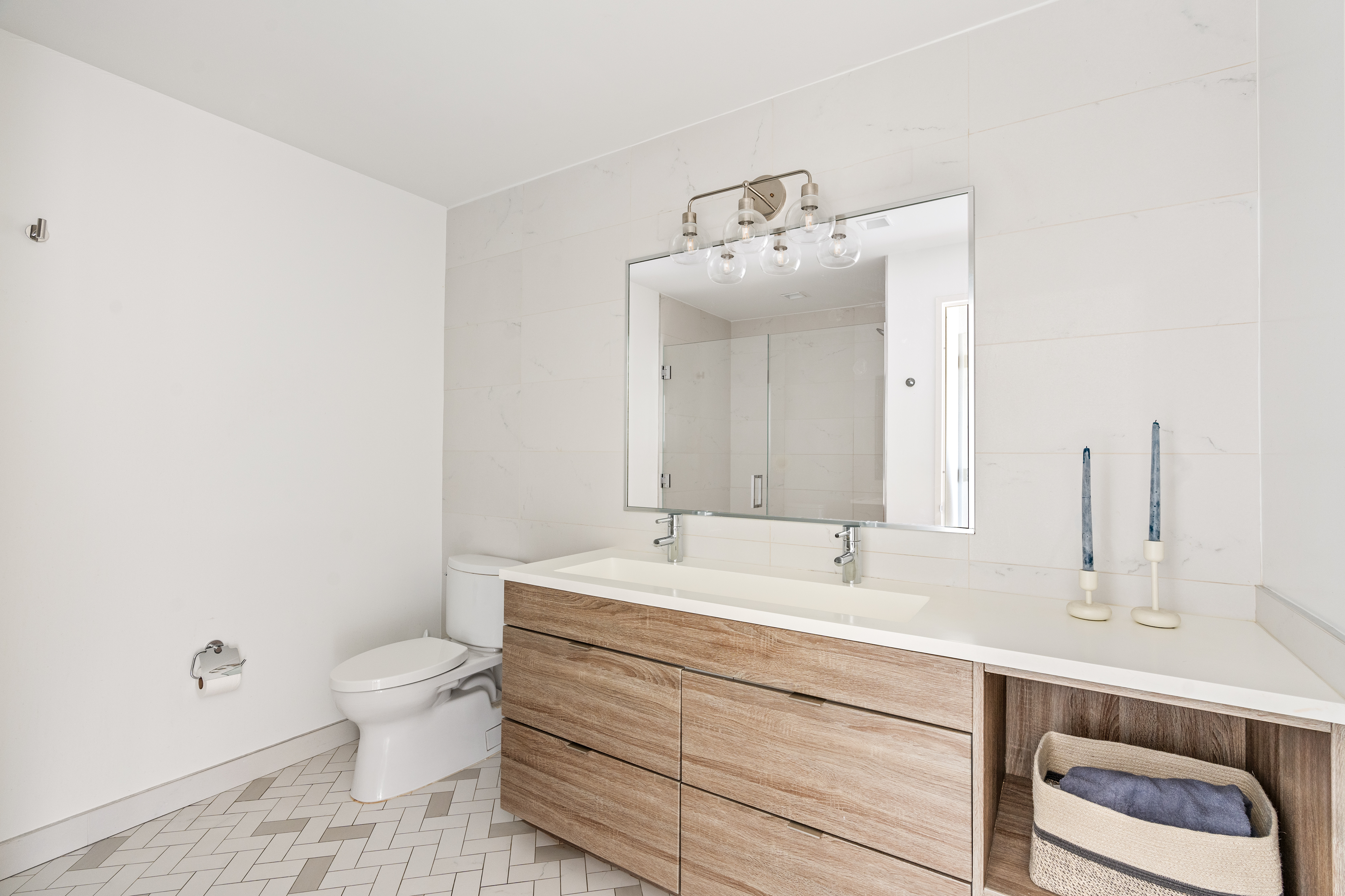 23 West 116th Street, Unit 7A Manhattan, NY 10026 - Photo 9 of 14 a bathroom with a sink vanity and toilet