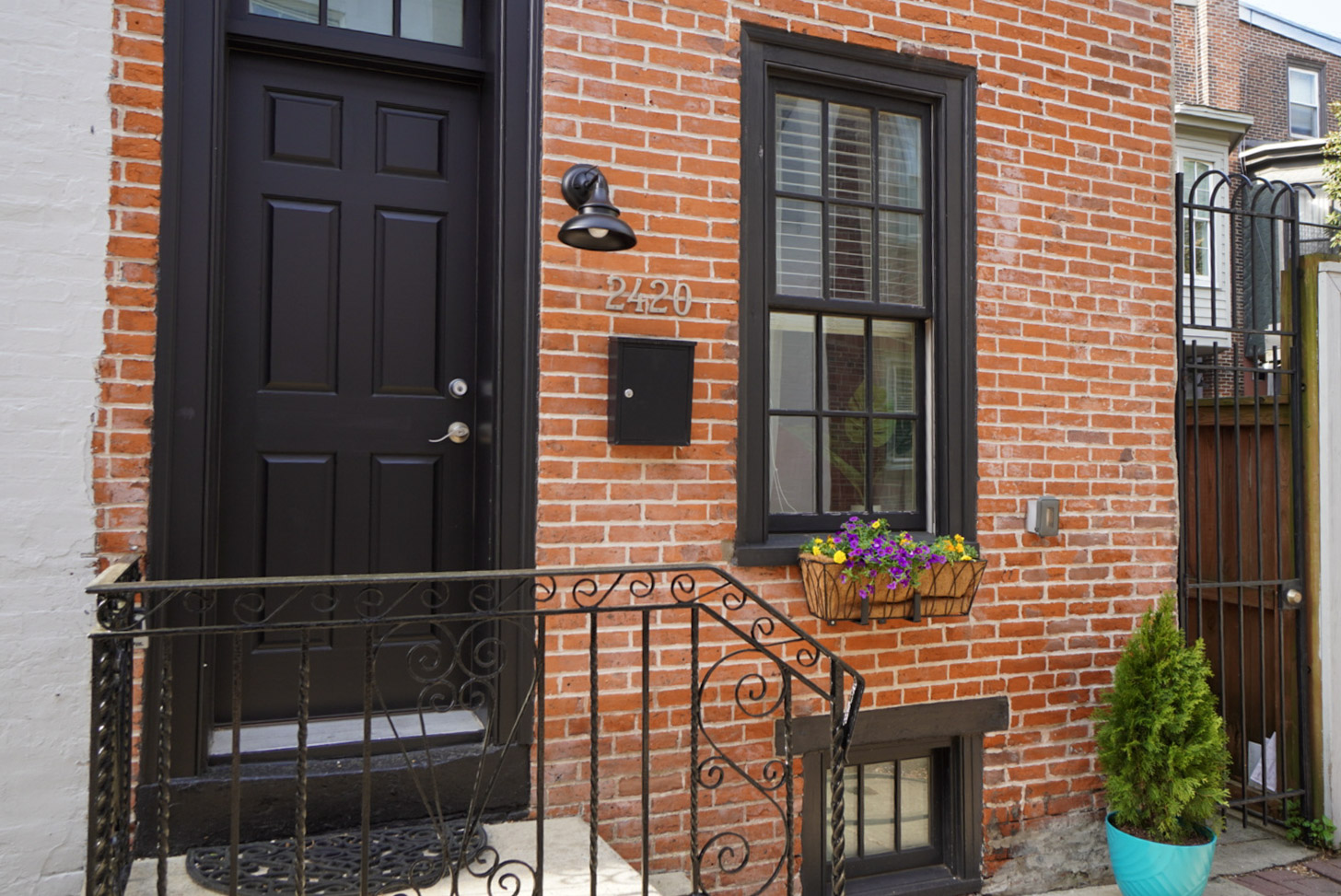 2420 Manning Street Philadelphia, PA 19103 - Photo 1 of 25 a front view of a house with street