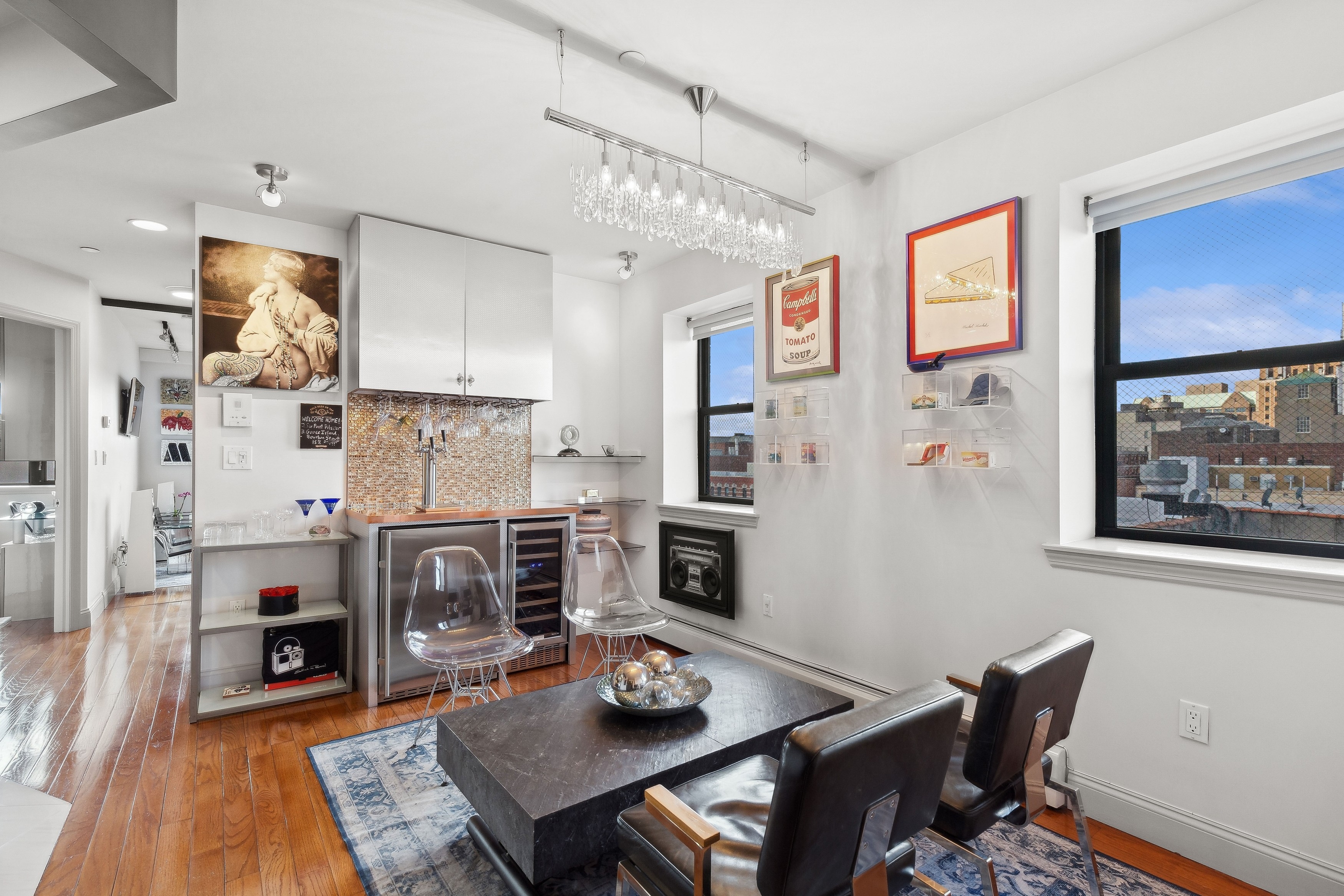 456 West 167th Street, Unit 7C Manhattan, NY 10032 - Photo 4 of 16 a living room with stainless steel appliances furniture a rug and a view of kitchen