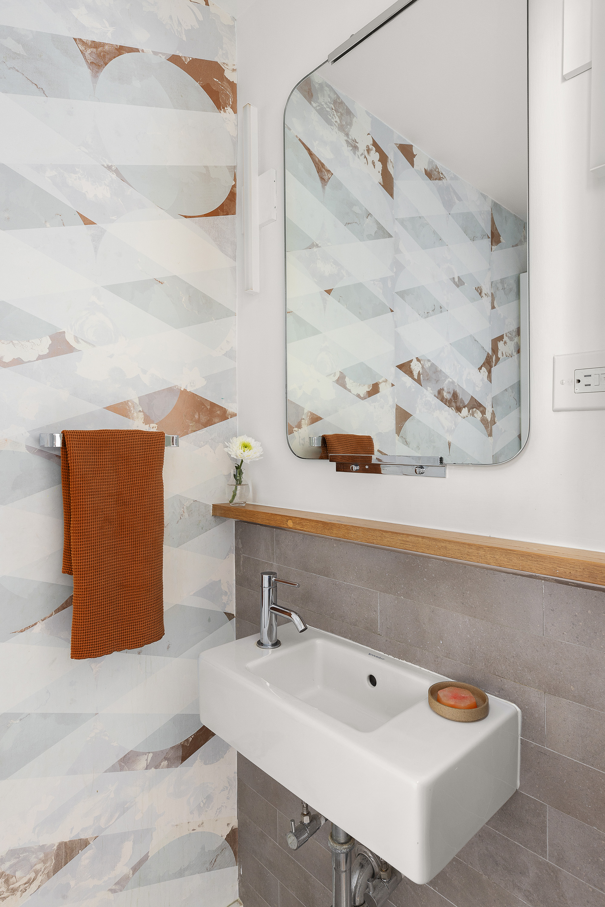 420 12th Street, Unit E1L Brooklyn, NY 11215 - Photo 7 of 15 a bathroom with a sink and a mirror