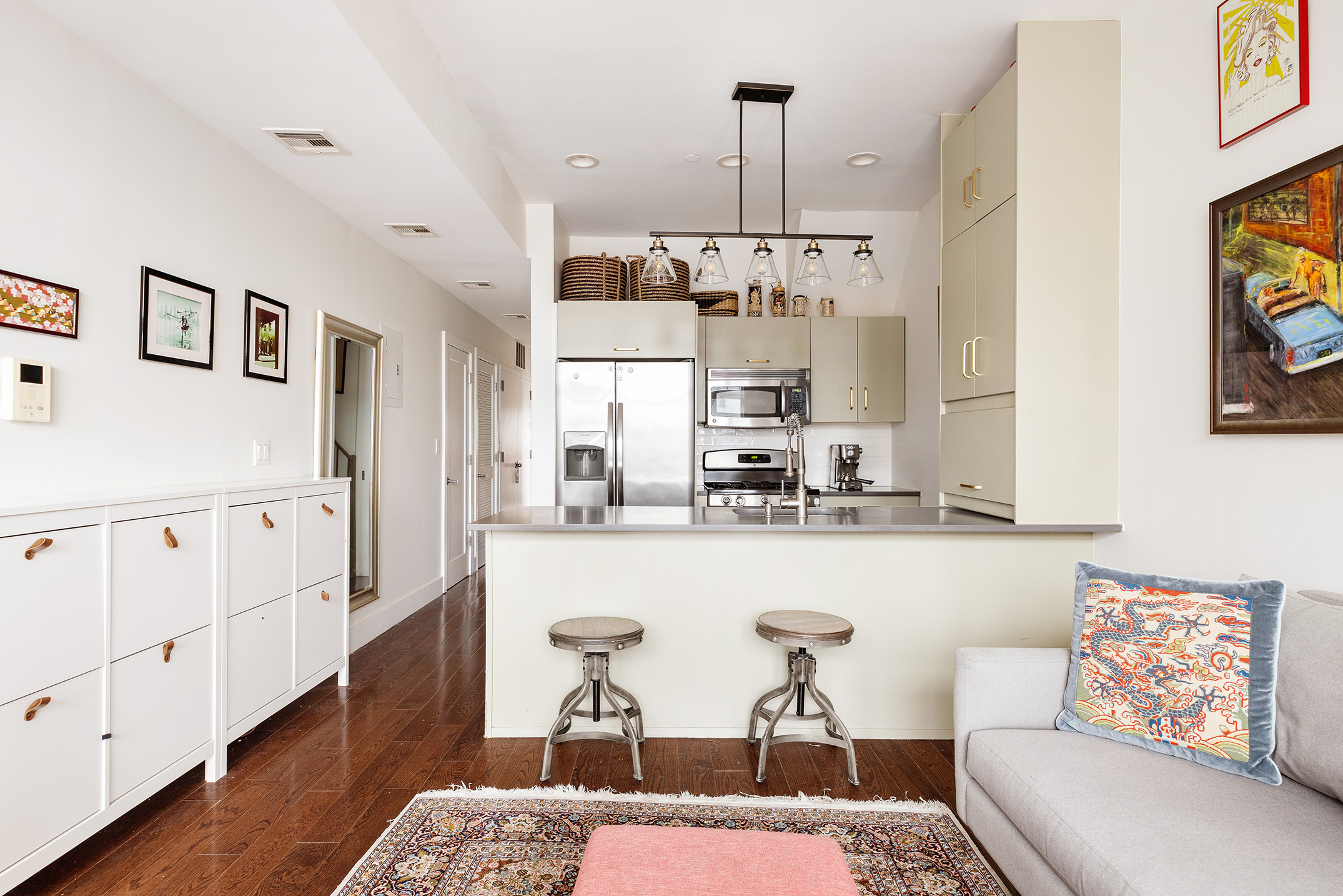 149 Conselyea Street, Unit 4B Brooklyn, NY 11211 - Photo 2 of 10 a living room with furniture and wooden floor