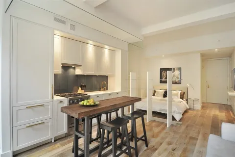 a workspace with furniture and wooden floor