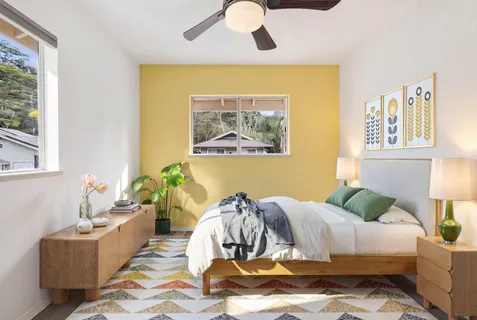 a bed room with a bed and a couch