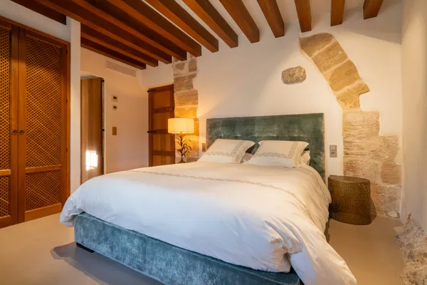 a view of a chairs and table in wooden floor