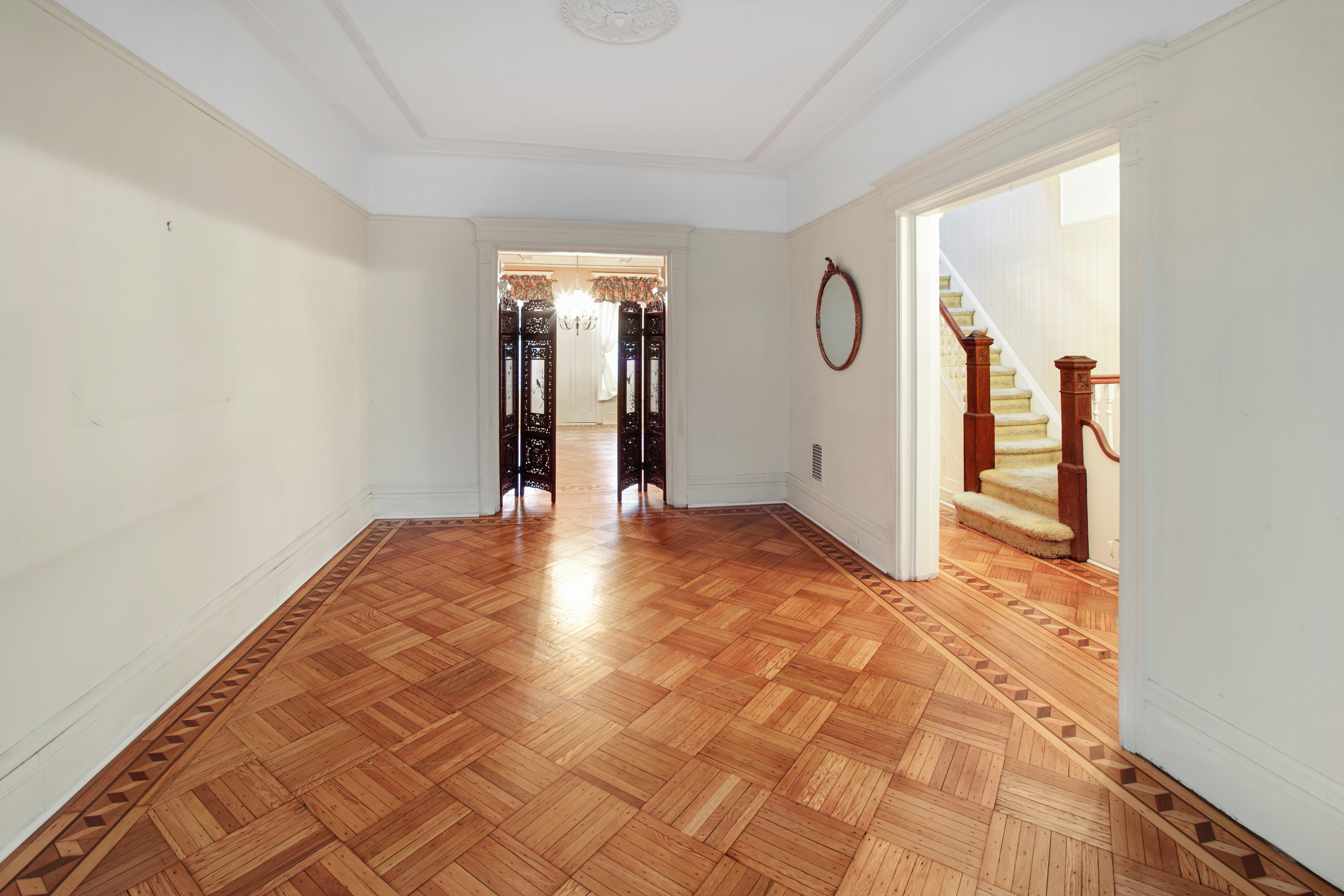 425 81st Street Brooklyn, NY 11209 - Photo 4 of 13 a view of empty room with wooden floor