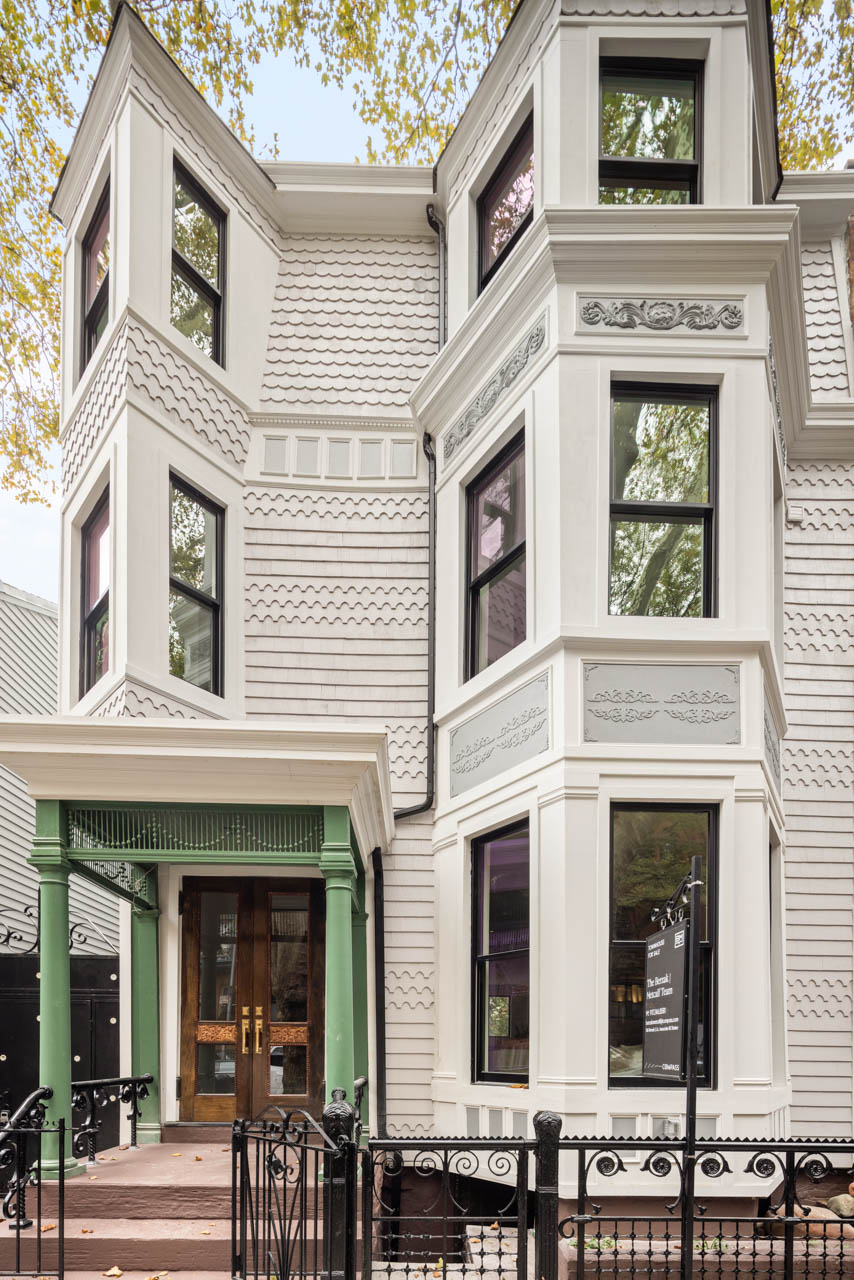 175 St James Place Brooklyn, NY 11238 - Photo 22 of 23 a view of a brick building with large windows
