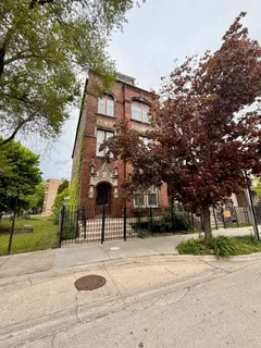 a view of a building with trees