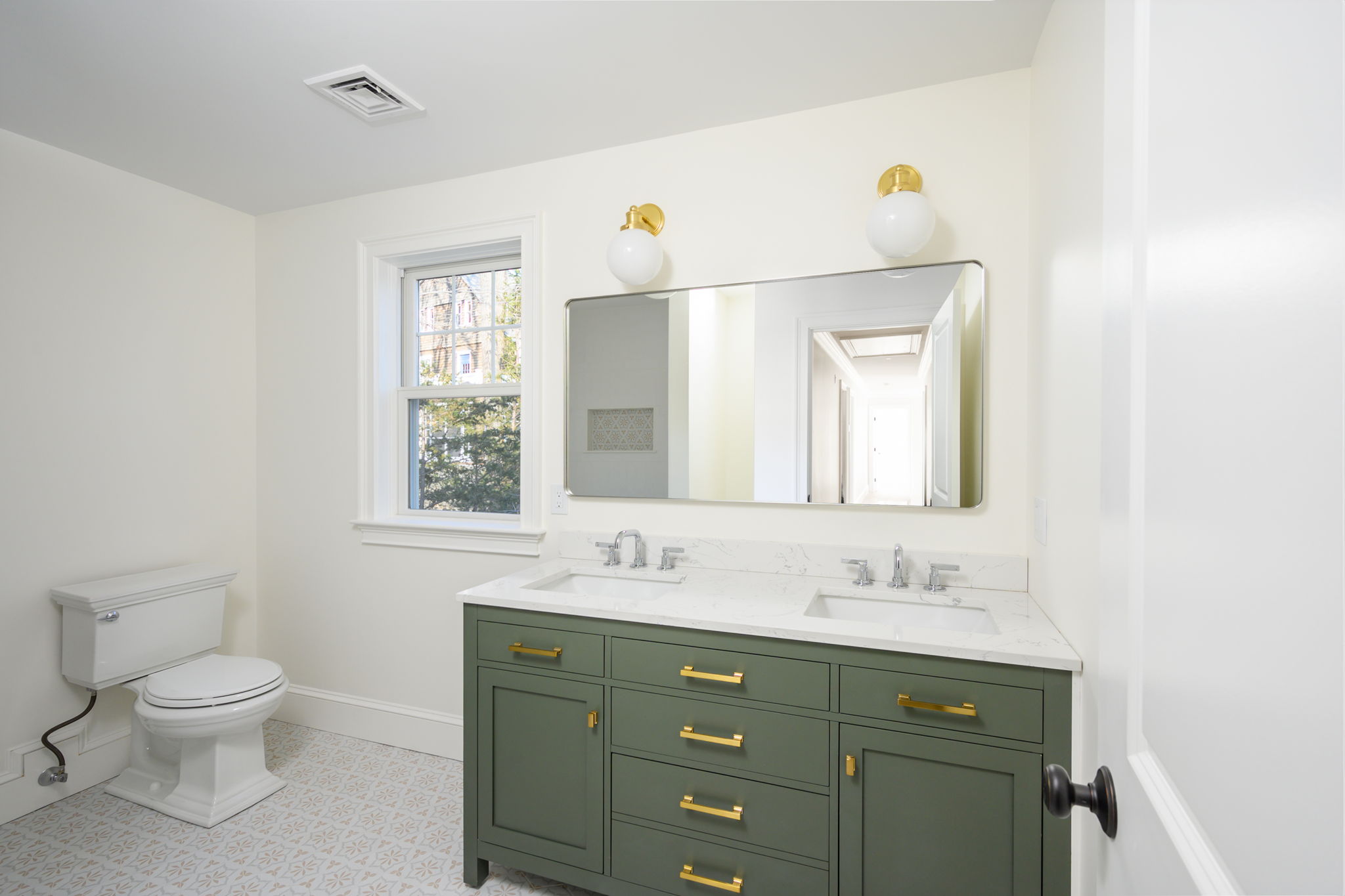 249 Central Avenue Milton, MA 02186 - Photo 38 of 61 a bathroom with a toilet sink and mirror