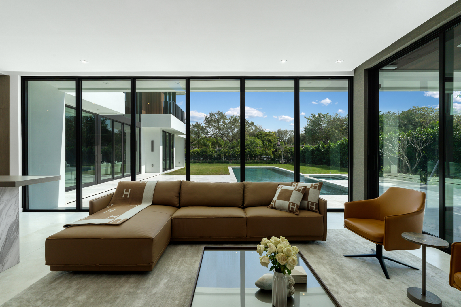 6920 Southwest 124th Street Pinecrest, FL 33156 - Photo 5 of 48 a living room with furniture and a large window