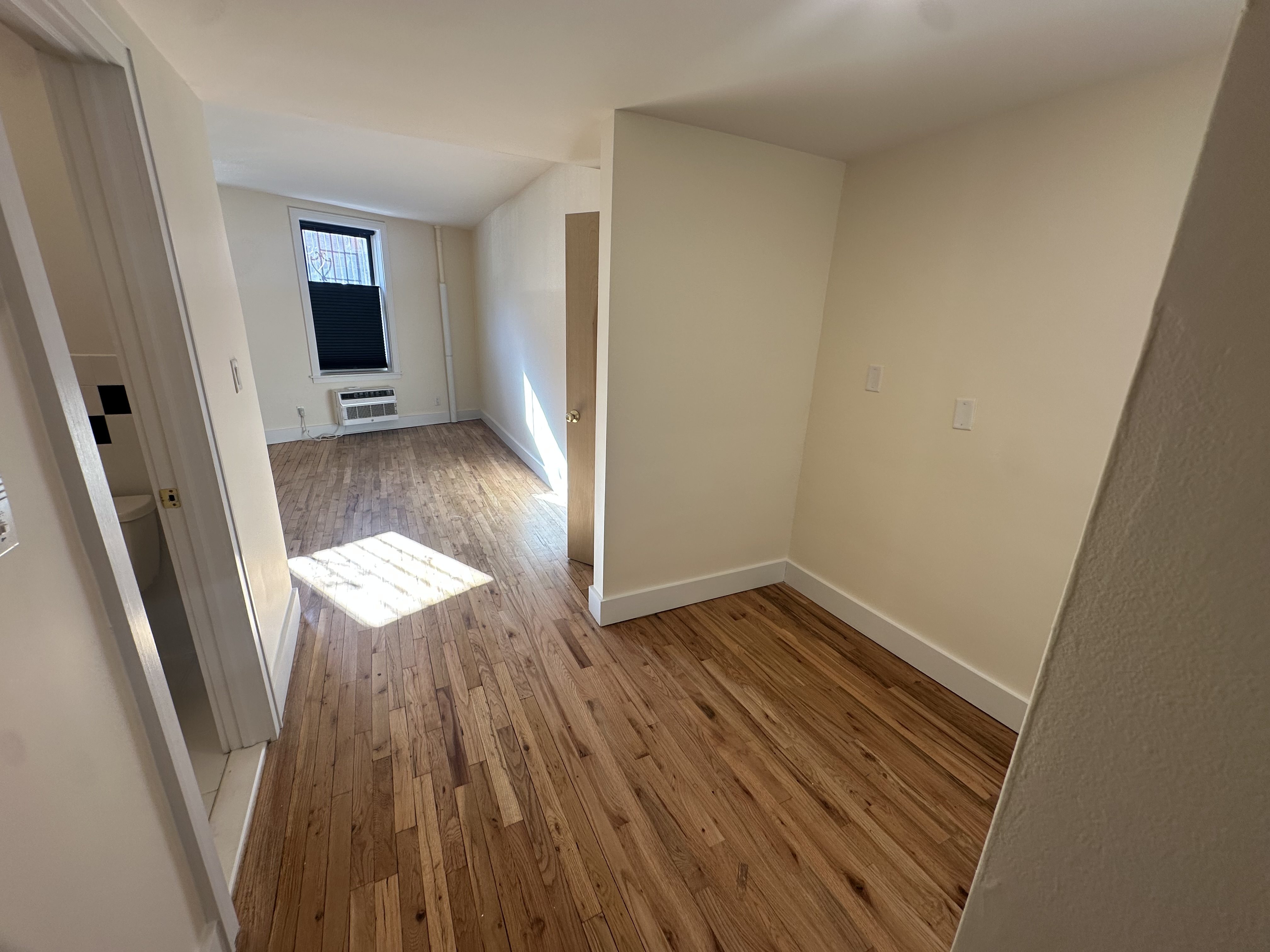 752 Greenwich Street, Unit 1A/B Manhattan, NY 10014 - Photo 8 of 12 wooden floor in an empty room