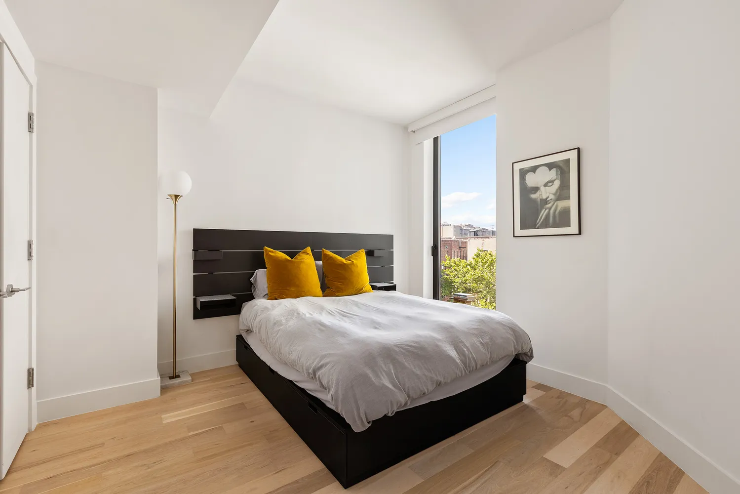a bathroom with a tub sink toilet and mirror