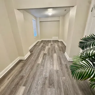 a bedroom with bed and a couch