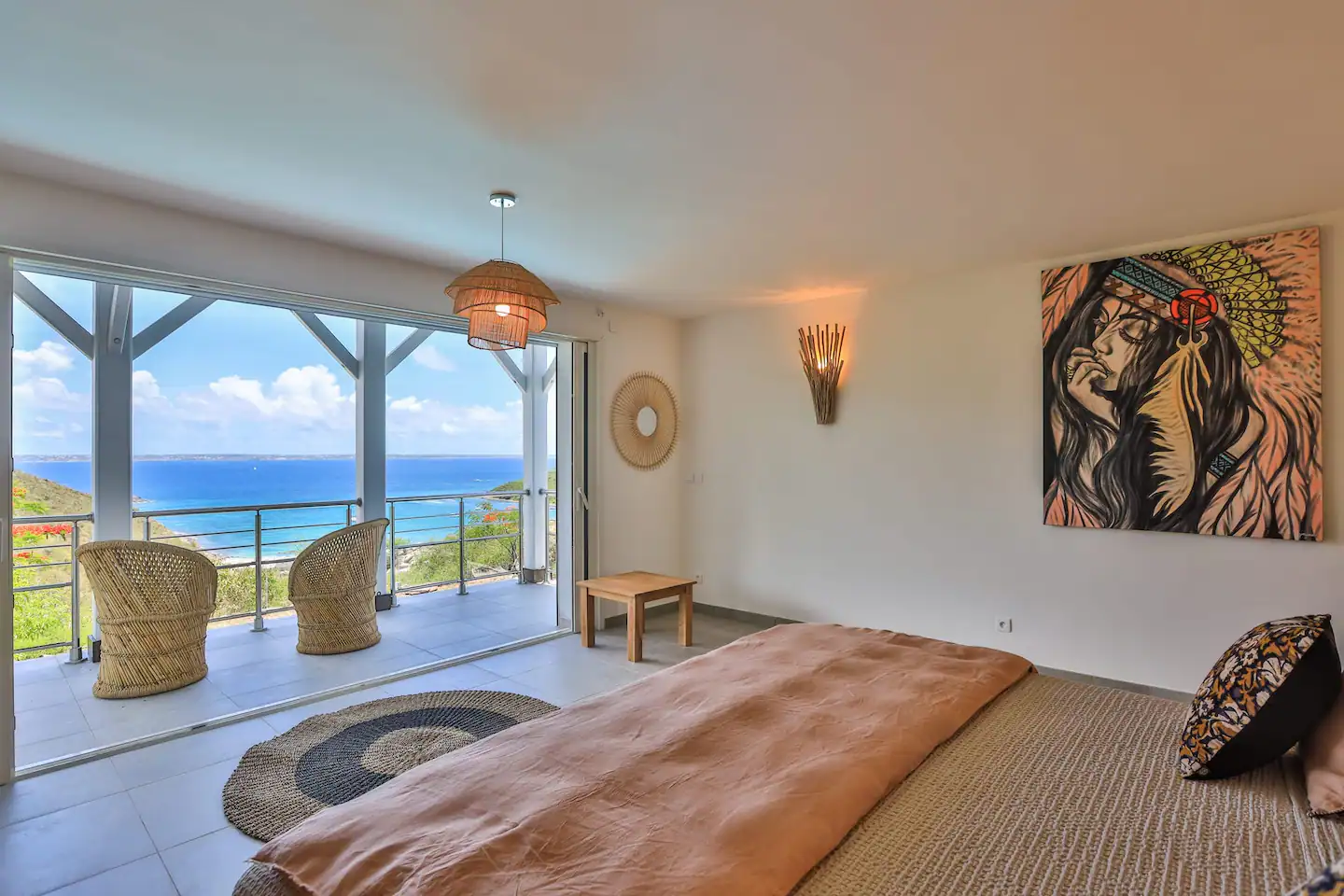 Anse Marcel St. Martin, undefined 97150 - Photo 10 of 15 a bedroom with furniture and a large window