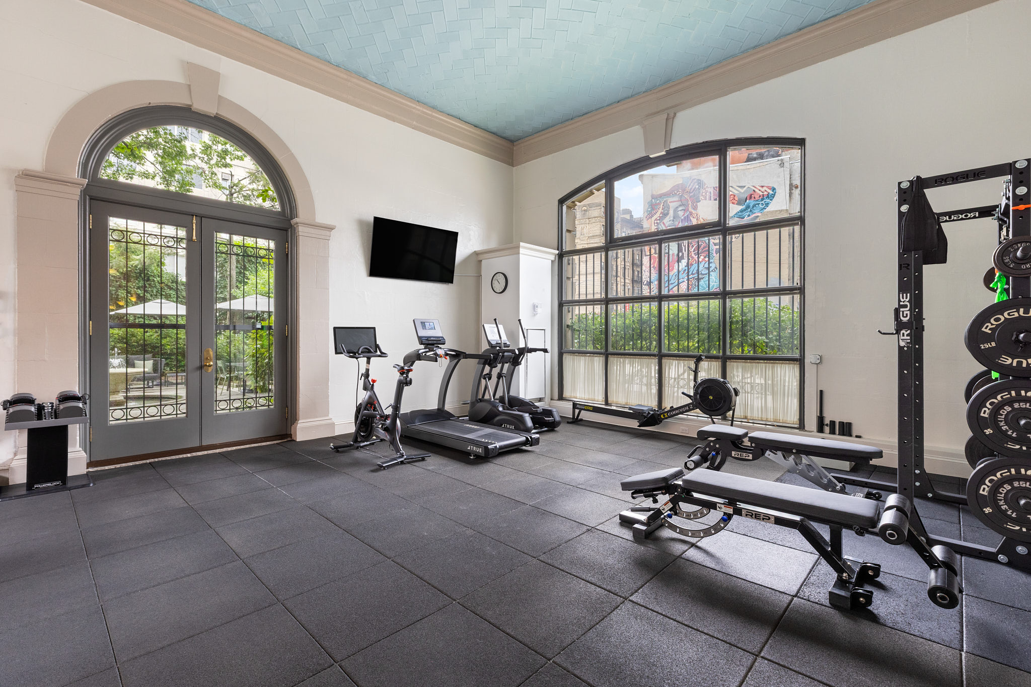 240 Centre Street, Unit 6N Manhattan, NY 10013 - Photo 13 of 16 a view of a livingroom with workspace and a large window