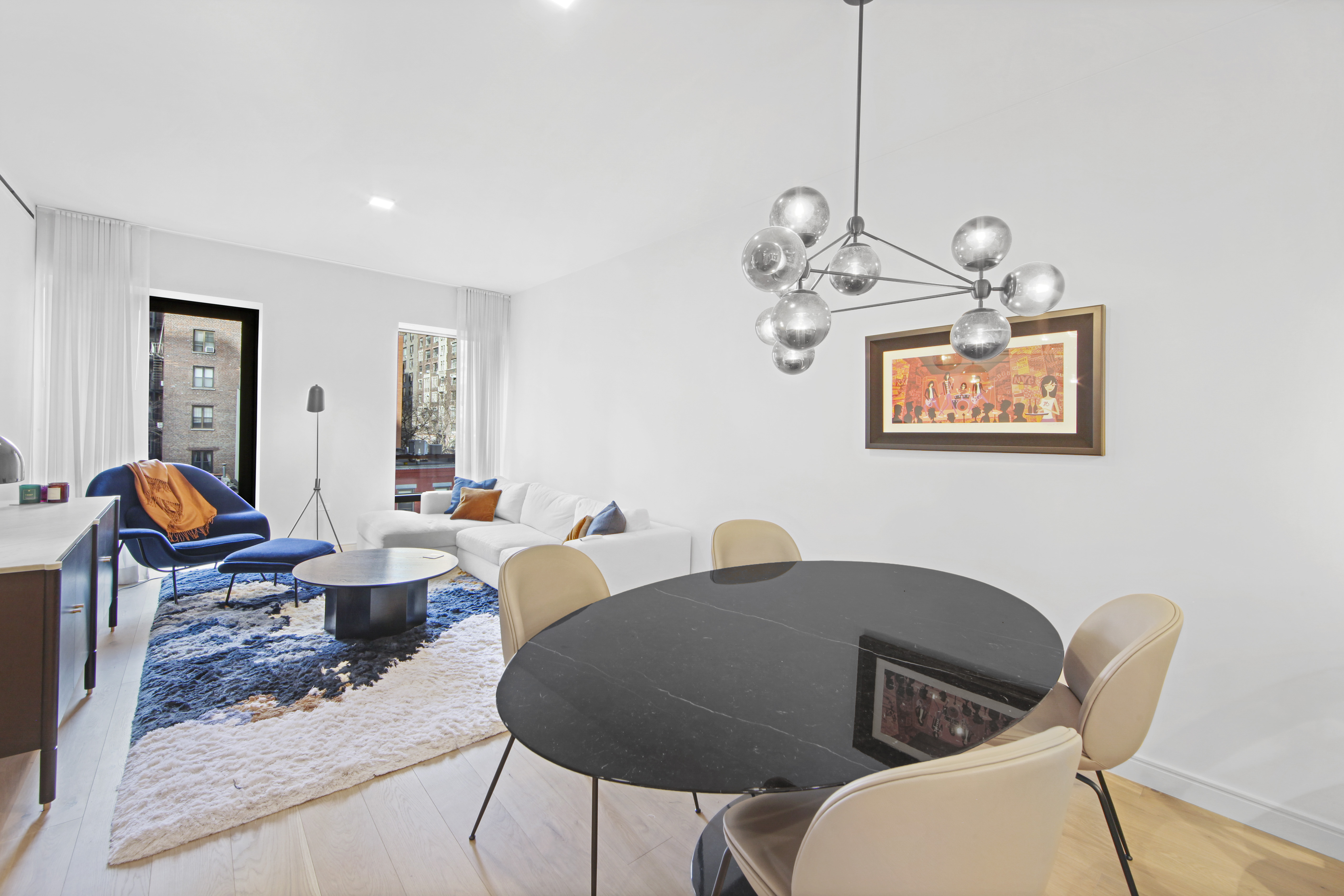 200 East 21st Street, Unit 4B Manhattan, NY 10010 - Photo 2 of 15 a view of a dining room with furniture