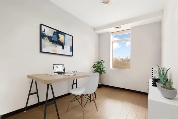 a bathroom with a sink a toilet a mirror and shower