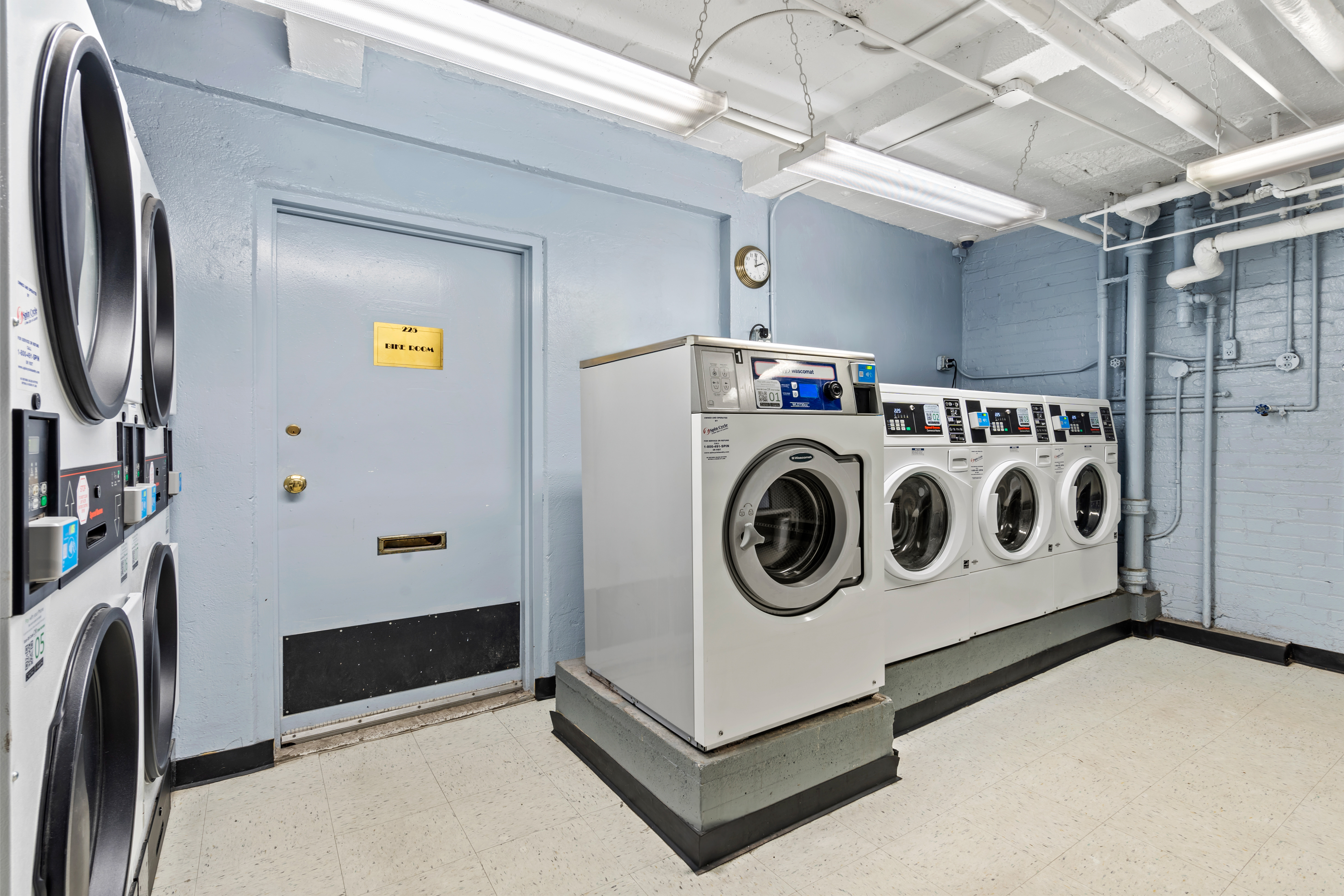 225 West 25th Street, Unit 5D Manhattan, NY 10001 - Photo 14 of 16 a utility room with dryer and washer
