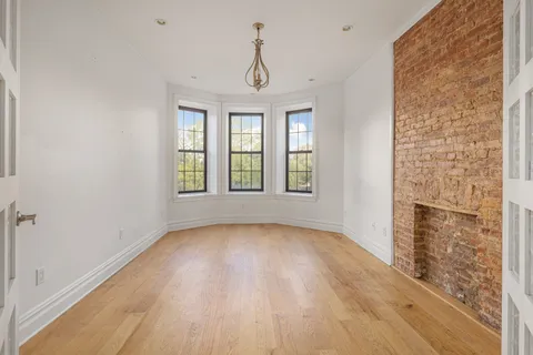 a view of livingroom with hardwood floor and window