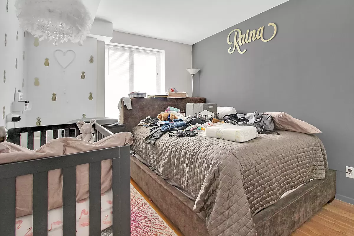 250 East 31st Street, Unit 5A Manhattan, NY 10016 - Photo 3 of 7 a bedroom with a bed and window