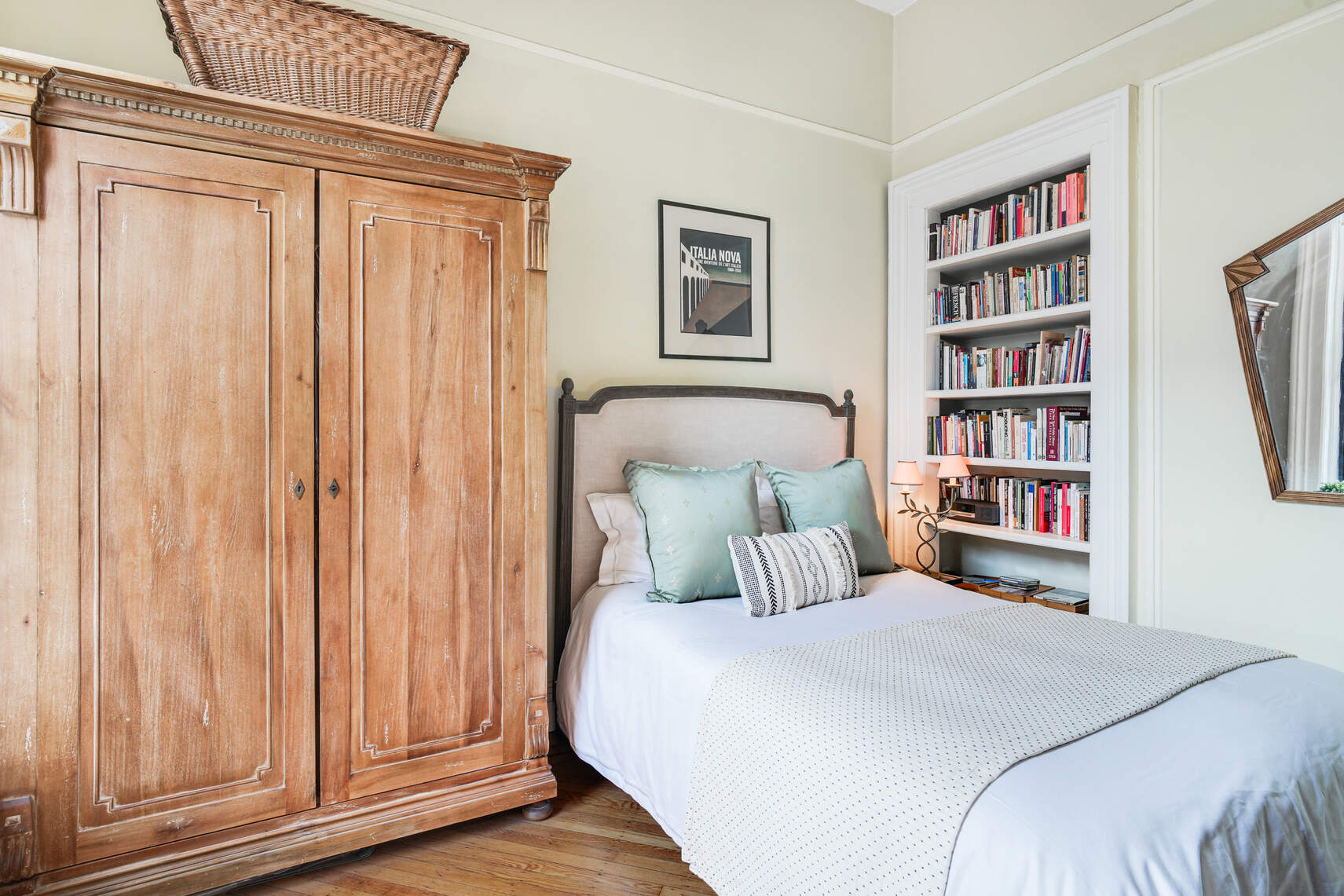 132 Joralemon Street, Unit 3BC Brooklyn, NY 11201 - Photo 10 of 16 a bedroom with a bed and a book shelf