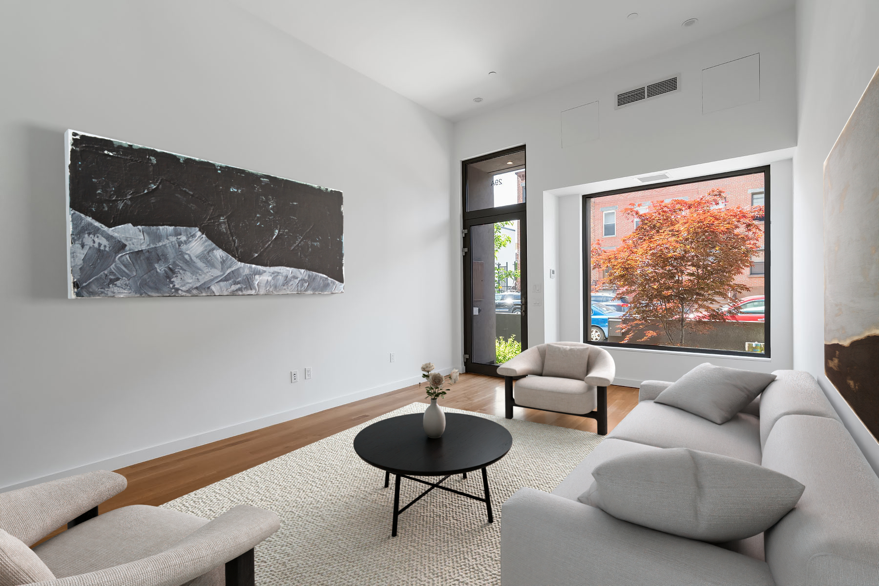 a living room with furniture and a large window