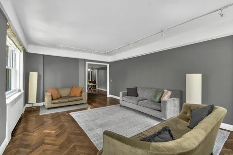 a living room with furniture and a couch