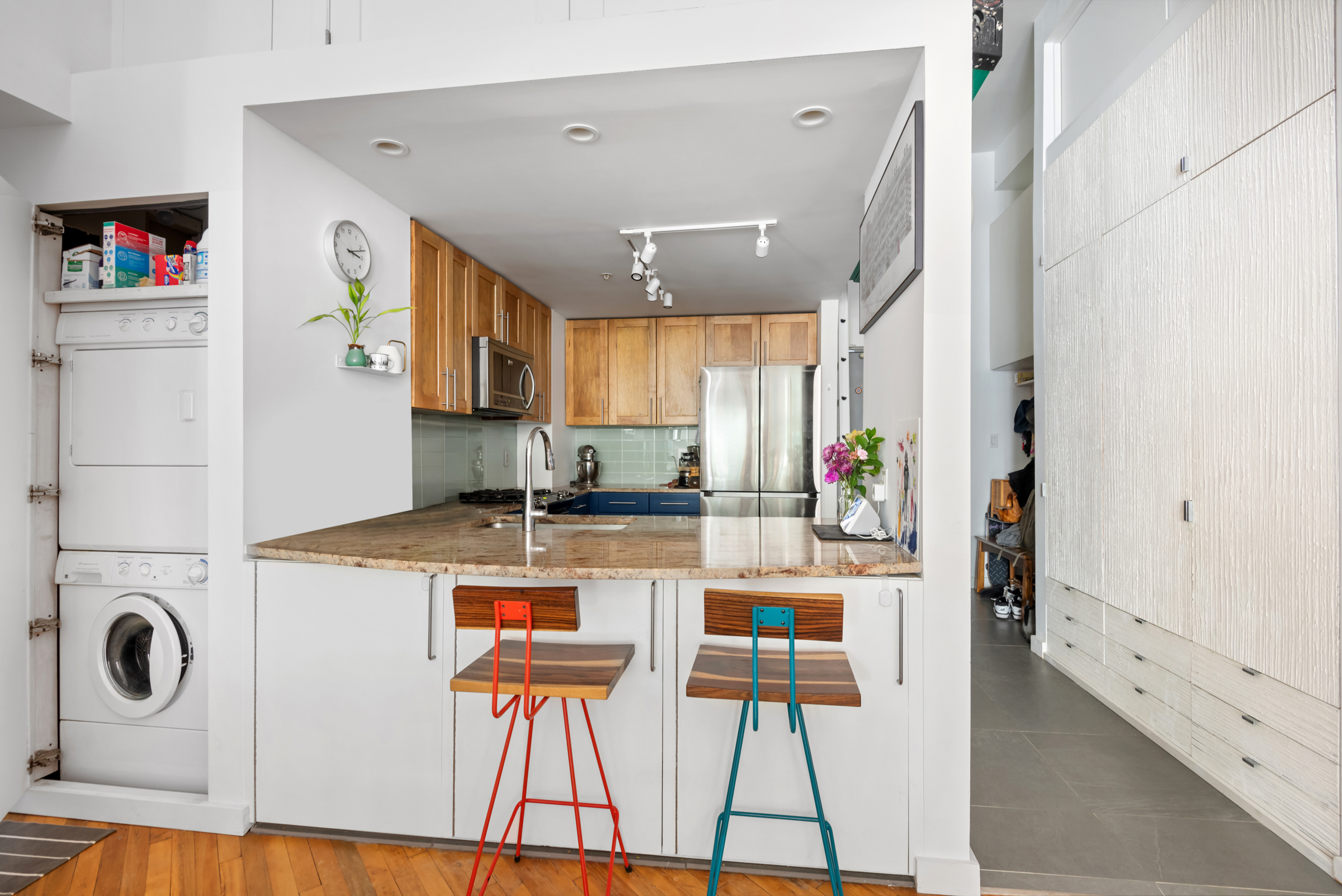 105 Lexington Avenue, Unit 2G Brooklyn, NY 11238 - Photo 6 of 17 a kitchen with stainless steel appliances granite countertop a refrigerator and a stove top oven