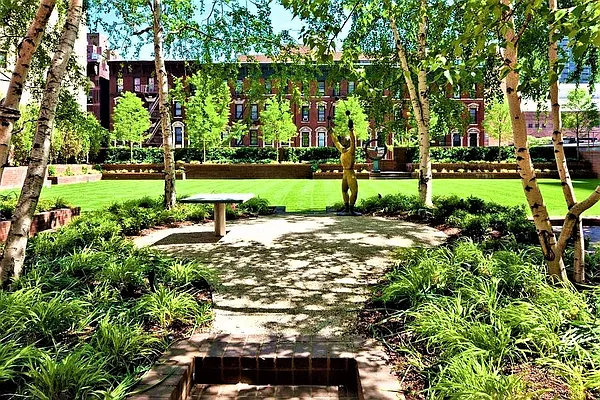 515 East 72nd Street, Unit 22E Manhattan, NY 10021 - Photo 12 of 18 a view of a park with large trees