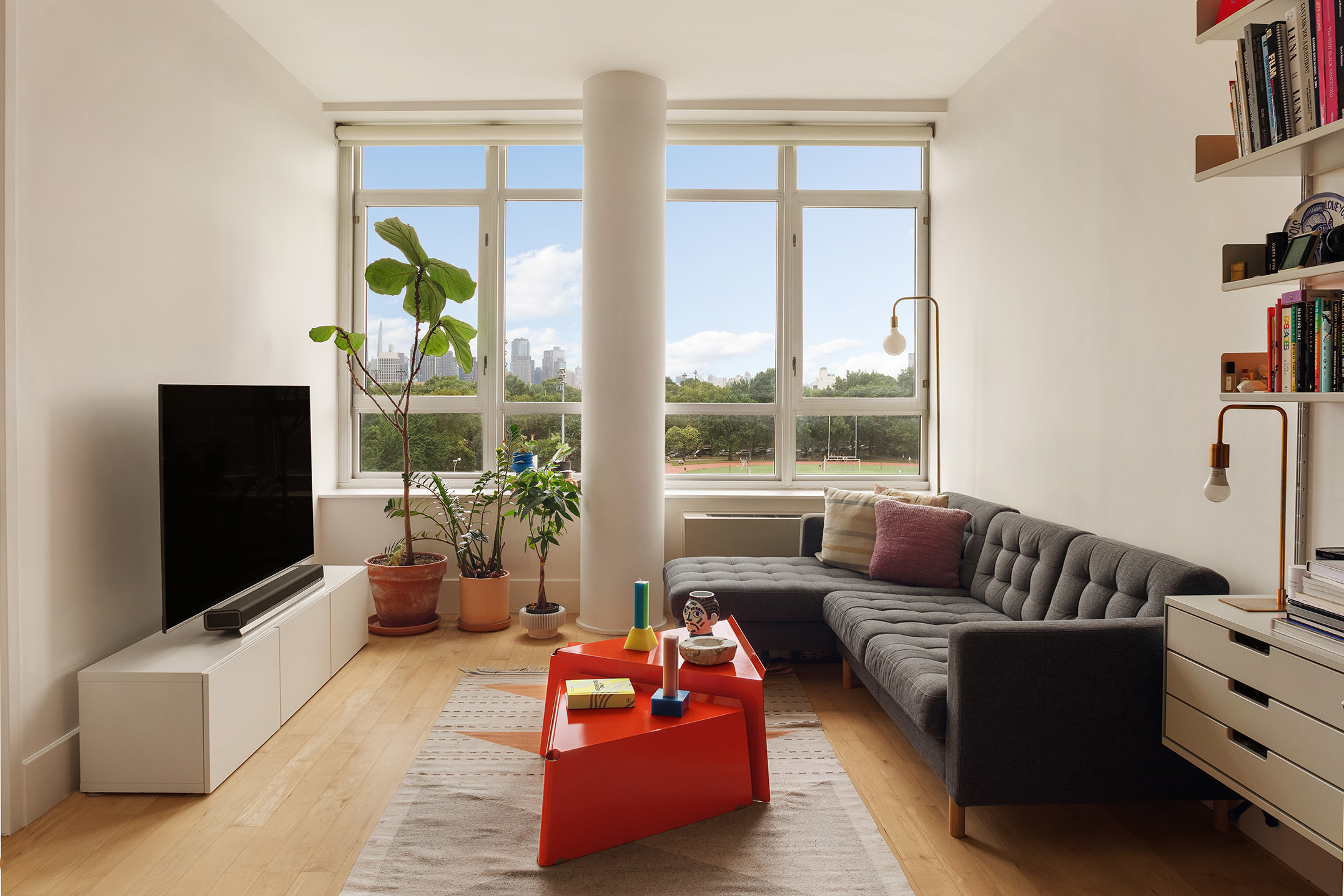 20 Bayard Street, Unit 6C Brooklyn, NY 11211 - Photo 1 of 10 a living room with furniture and a flat screen tv