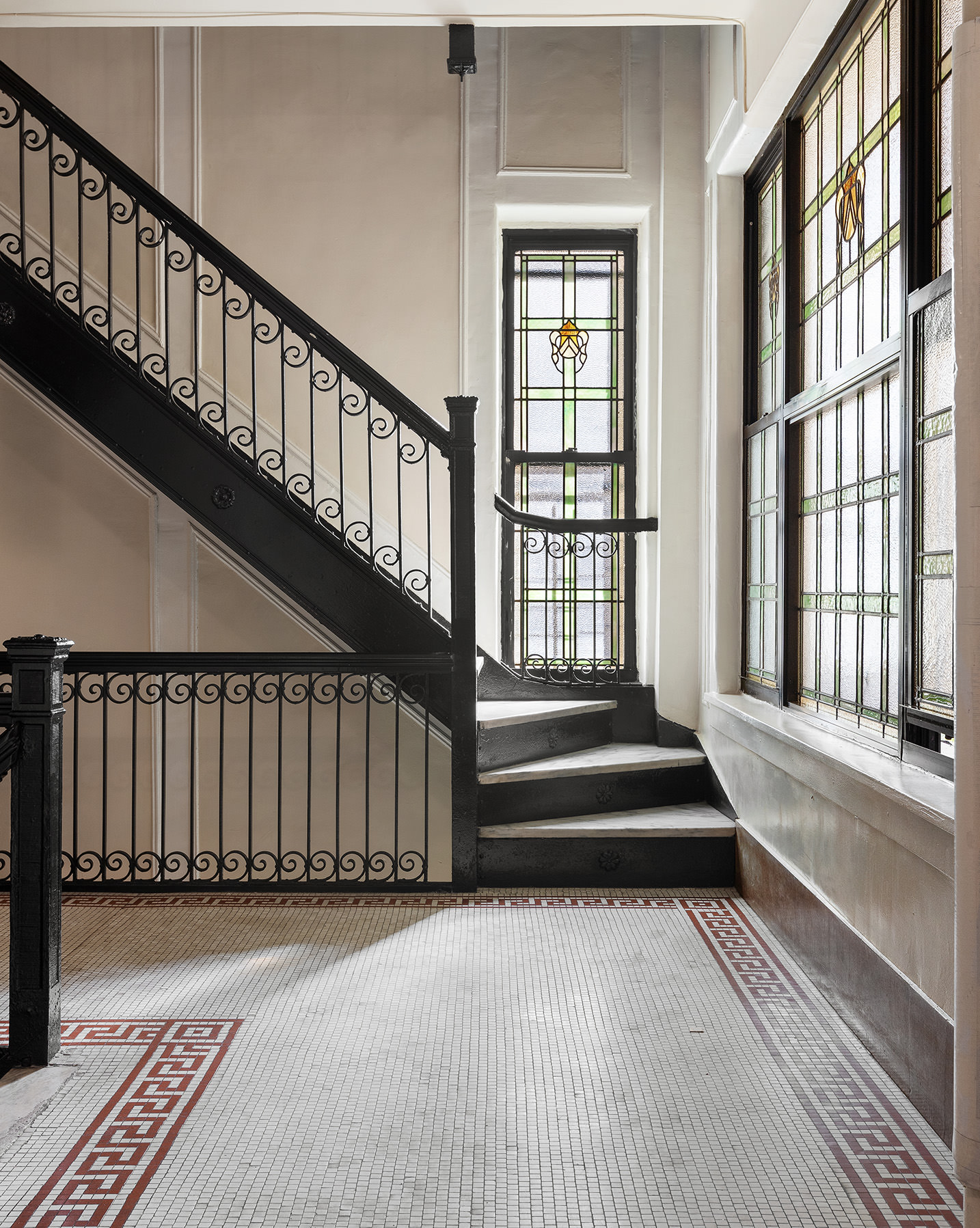251 West 89th Street, Unit 4D Manhattan, NY 10024 - Photo 18 of 20 a view of staircase with wooden floor and a rug