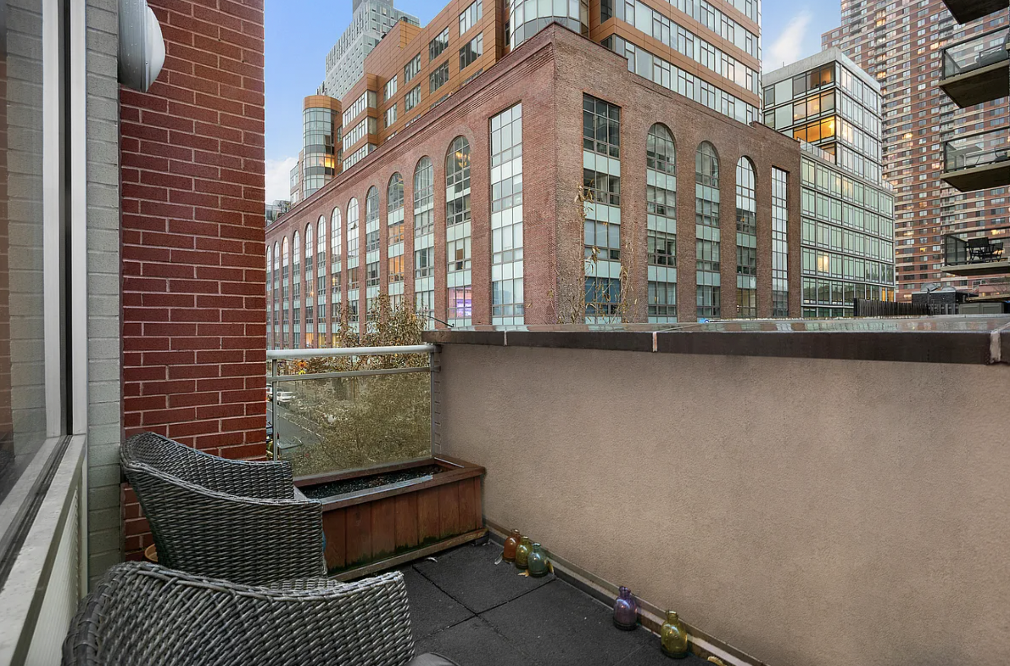 2-40 51st Avenue, Unit 2N Queens, NY 11101 - Photo 4 of 10 an outdoor view of building with a window