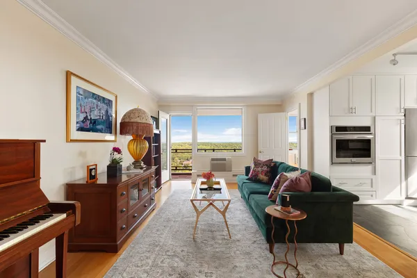 a living room with furniture and a window